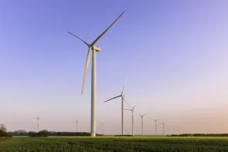 Wind turbines in the UK at sunset