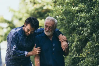 Father and son walking together