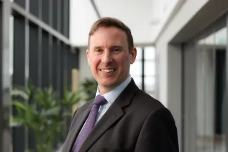 Headshot image of Neil Cowan