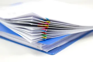 documents with colourful paper clips