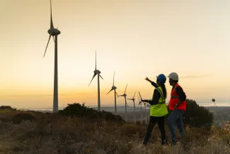 wind turbines and workers