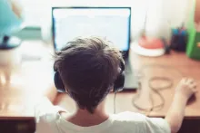 Child on computer accessing online content