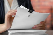 Woman holding documents